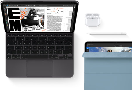 iPad Pro attached to Magic Keyboard, front exterior, space black color, rounded corners, black display bezel, open, display showing article editing app with text and photograph of a woman playing music, Airpods 4 in open case, blue Smart Folio cover on iPad Pro with Apple Pencil Pro resting atop device, cover slightly open revealing display